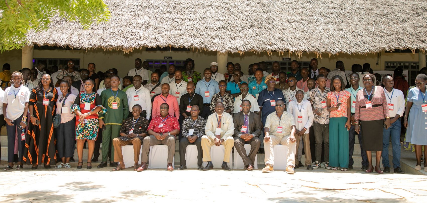 LES25 delegates in a group photograph outside the venue