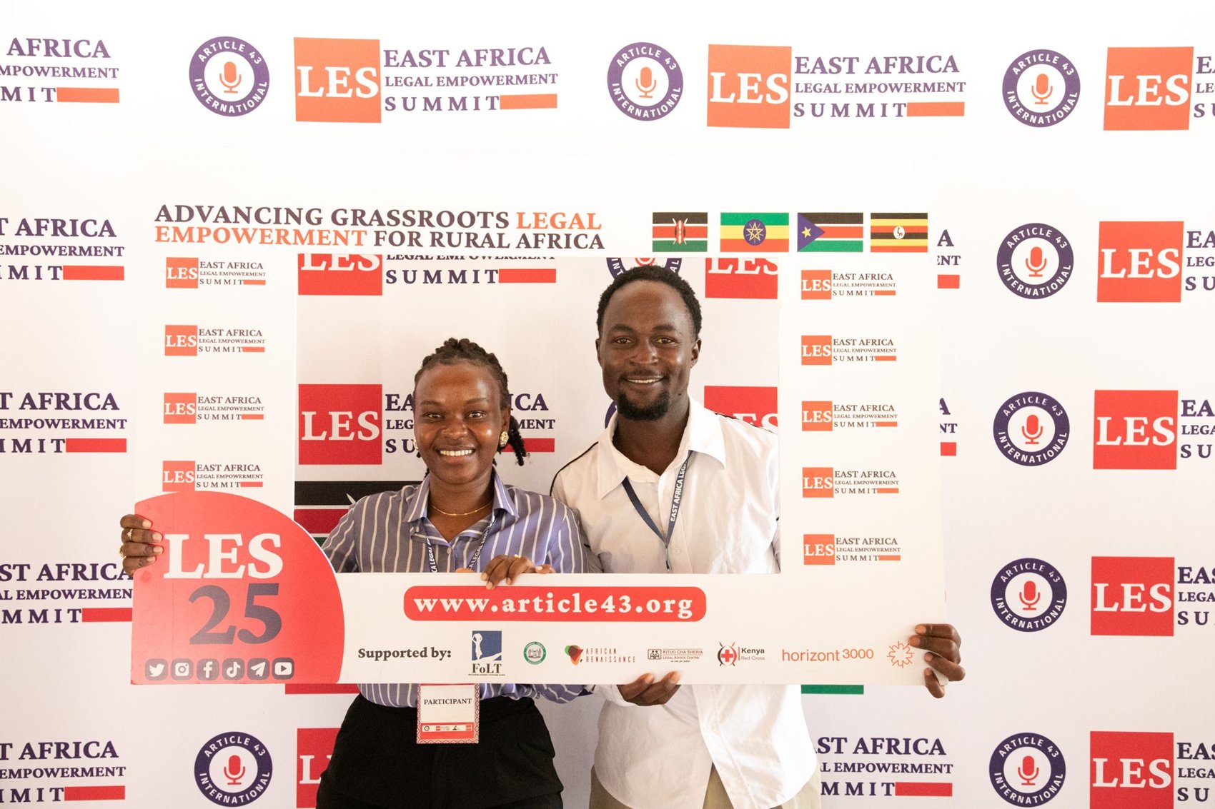 Attendees at LES25 backdrop